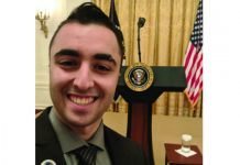 Junior accounting major and Turning Point USA president Joshua Aminov poses at the White House during his March 21 visit.