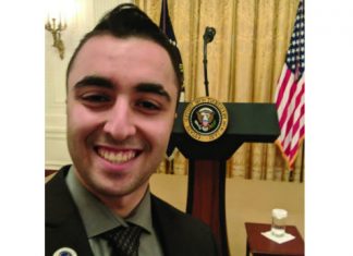 Junior accounting major and Turning Point USA president Joshua Aminov poses at the White House during his March 21 visit.